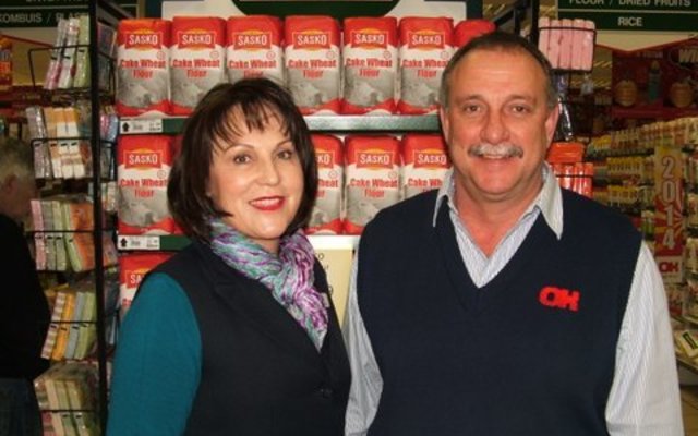 Proud store owners of OK Foods Gansbaai, Petra and Chris van Rensburg